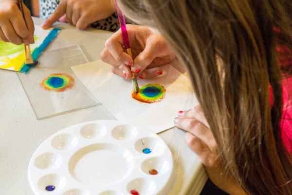 Kids doing press painting, Yellowstone National Park